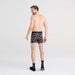 Back - Model wearing DropTemp Cooling Cotton Boxer Brief in Happy Hour- Black