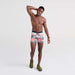 Front - Model wearing Quest Baselayer Boxer Brief in Mountain Abstract- Multi