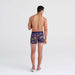 Back - Model wearing Vibe Boxer Brief in Disco Fruit-Maritime Blue