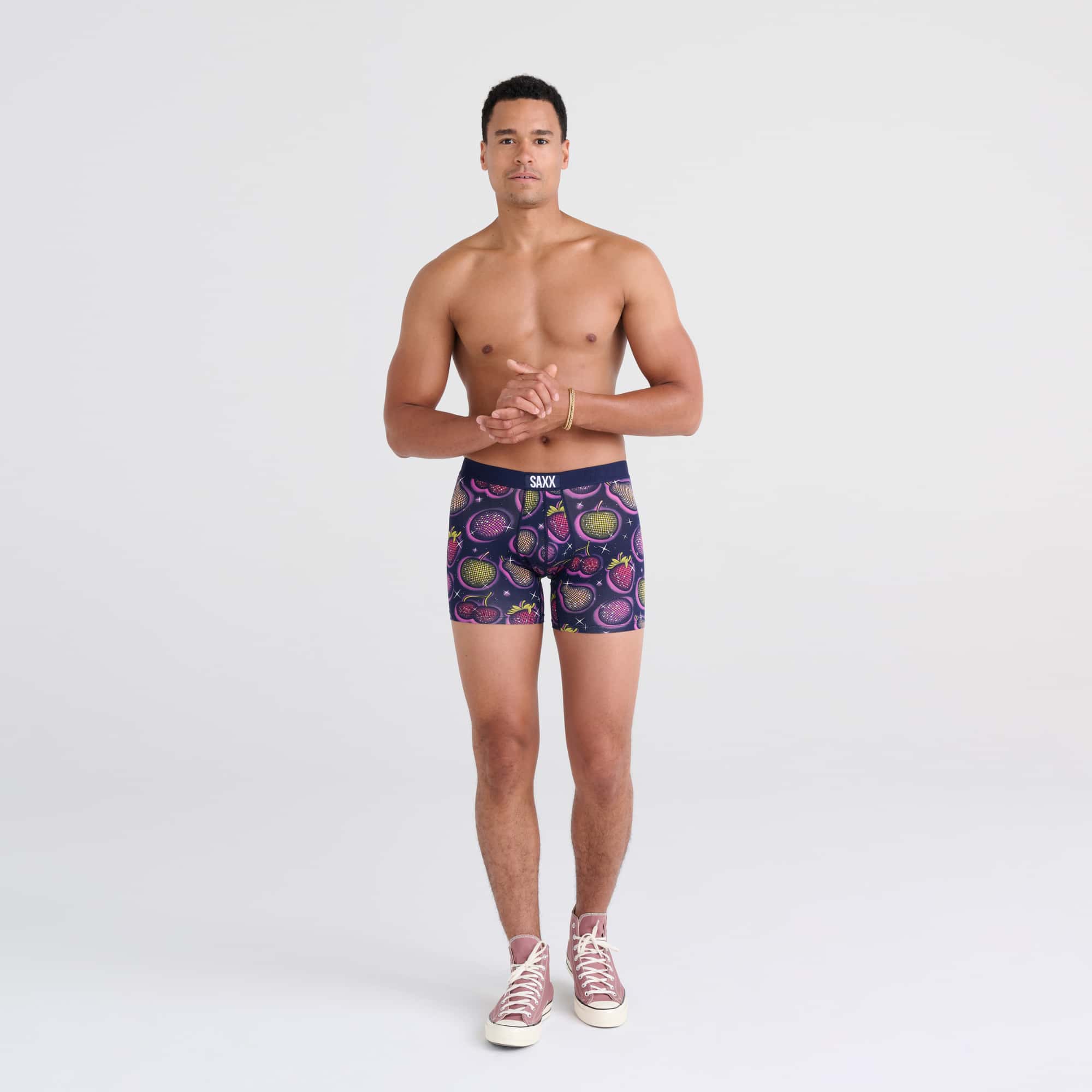 Front - Model wearing Vibe Boxer Brief in Disco Fruit-Maritime Blue