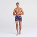 Front - Model wearing Vibe Boxer Brief in Disco Fruit-Maritime Blue