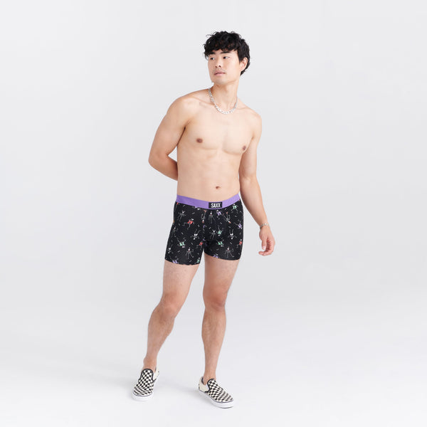 Front - Model wearing Vibe Super Soft Boxer Brief in Dancing Skellies- Black