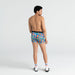 Back - Model wearing Vibe Boxer Brief in The Bright Side- Blue