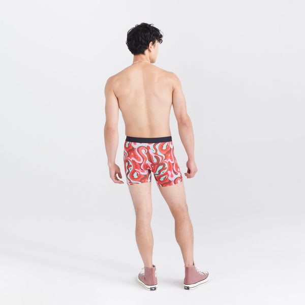 Back - Model wearing Vibe Super Soft Boxer Brief in Lava Lamp Flamingo- Multi