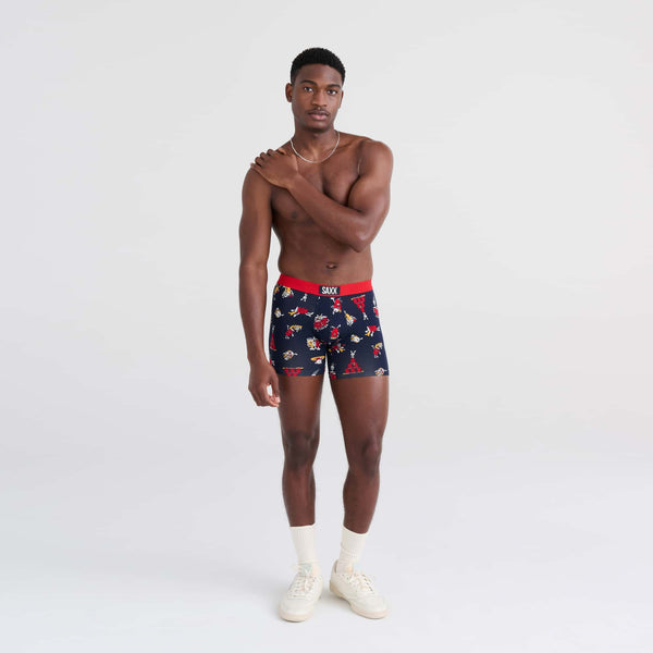 Front - Model wearing Vibe Boxer Brief in Party Foul- Dark Ink