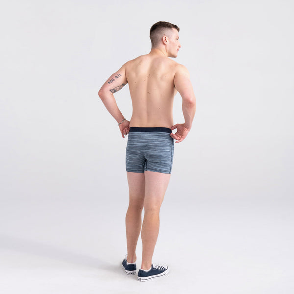 Back - Model wearing Vibe Super Soft Boxer Brief in Spacedye Heather- Blue