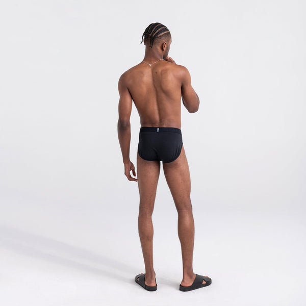 Back - Model wearing DropTemp Cooling Cotton Brief in Black