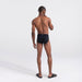 Back - Model wearing DropTemp Cooling Cotton Brief in Black
