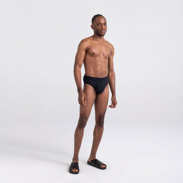Front - Model wearing DropTemp Cooling Cotton Brief in Black