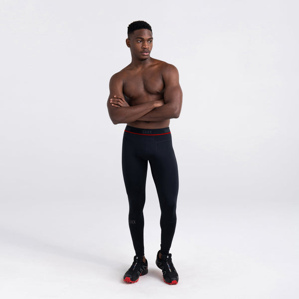 Front - Model wearing Kinetic Light-Compression Mesh Tight in Black
