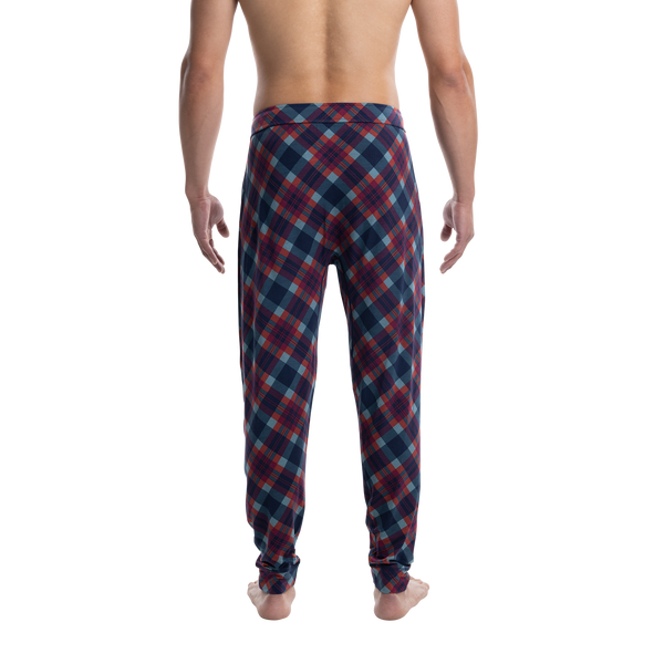 Back - Model wearing Snooze Sleep Pant in Olympia Flannel- Multi
