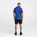 Back - Model wearing Droptemp All Day Cooling  Polo in Sport Blue Heather
