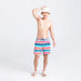 Front - Model wearing Betawave 2N1 Swim Board Short 17" in Cutback Stripe- Multi