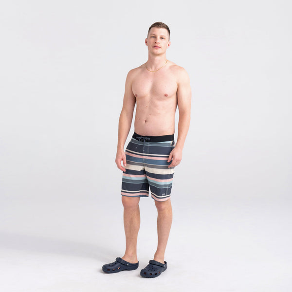 Front - Model wearing Betawave 2N1 Swim Short Long in Big Splash Rugby- Blue