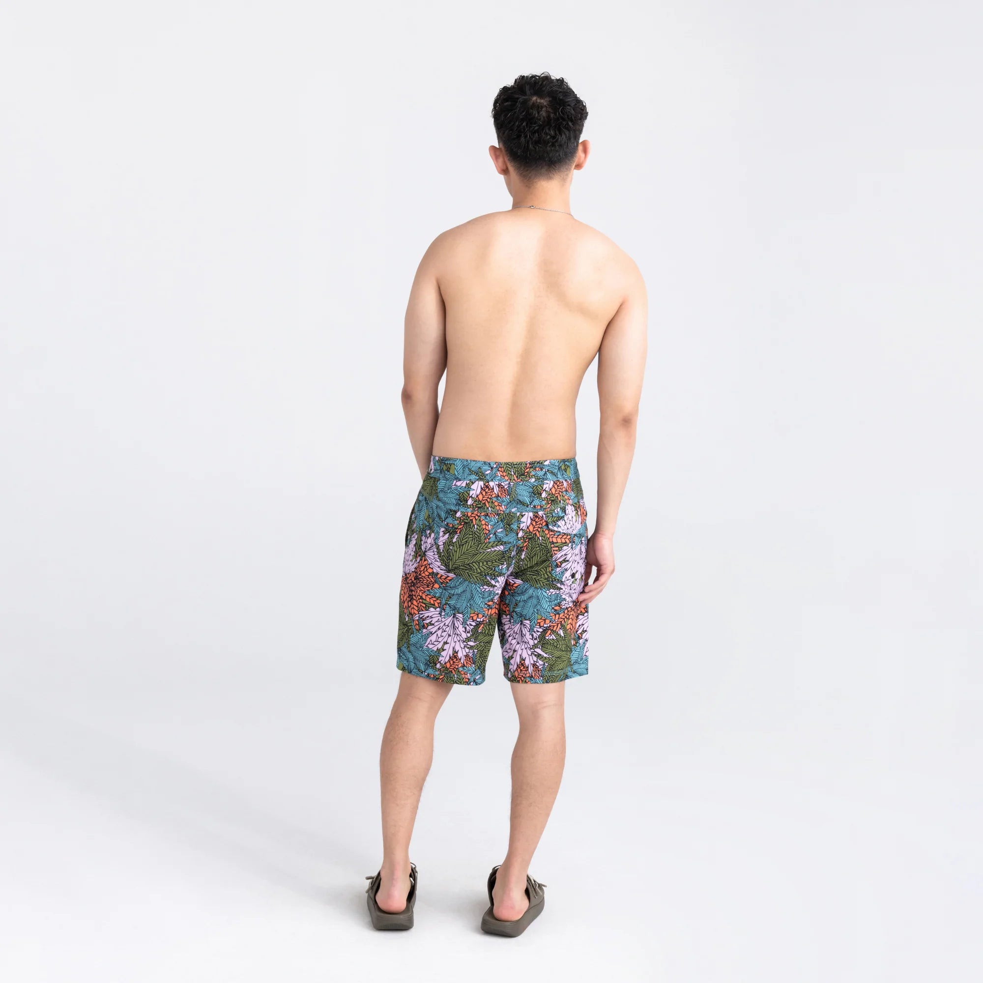 Back - Model wearing Betawave 2N1 Swim Board Short 19" in Sub Tropic- Multi