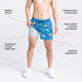 Model wearing Oh Buoy 2N1 Swim Volley Short 5" in Beer Olympics- Racer Blue with liner