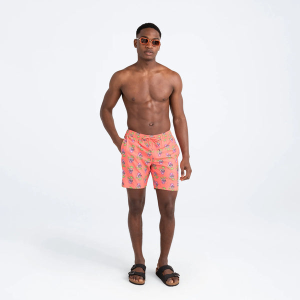 Front - Model wearing Oh Buoy 2N1 Swim Volley Short 7" in Drunken Skulls- Hot Coral