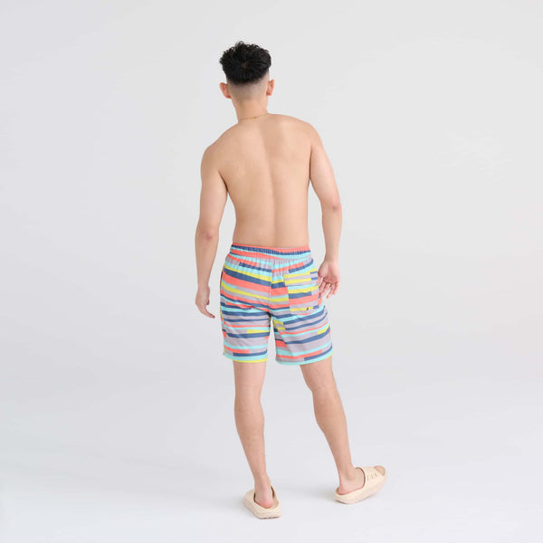 Back - Model wearing Oh Buoy 2N1 Swim Trunk 7" in Improv Stripe-Alloy Multi