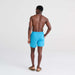 Back - Model wearing Go Coastal 2N1 Swim Volley 5" Inseam in Bluejay