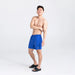 Front - Model wearing Go Coastal 2N1 Swim Volley Short 5" in Sport Blue