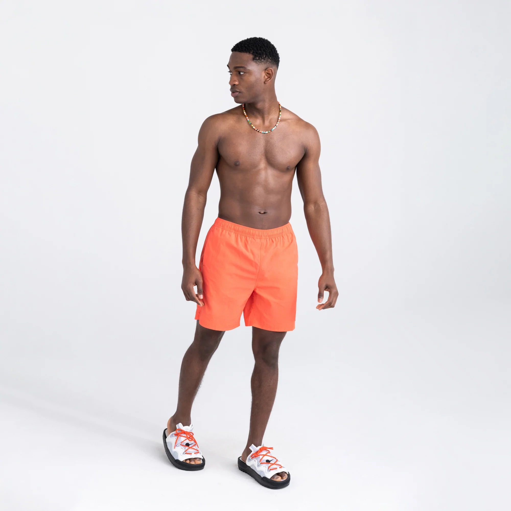 Front - Model wearing Go Coastal 2N1 Swim Volley Short 7" in Hot Coral