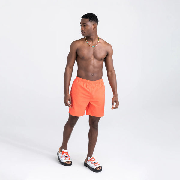 Front - Model wearing Go Coastal 2N1 Swim Volley Short 7" in Hot Coral