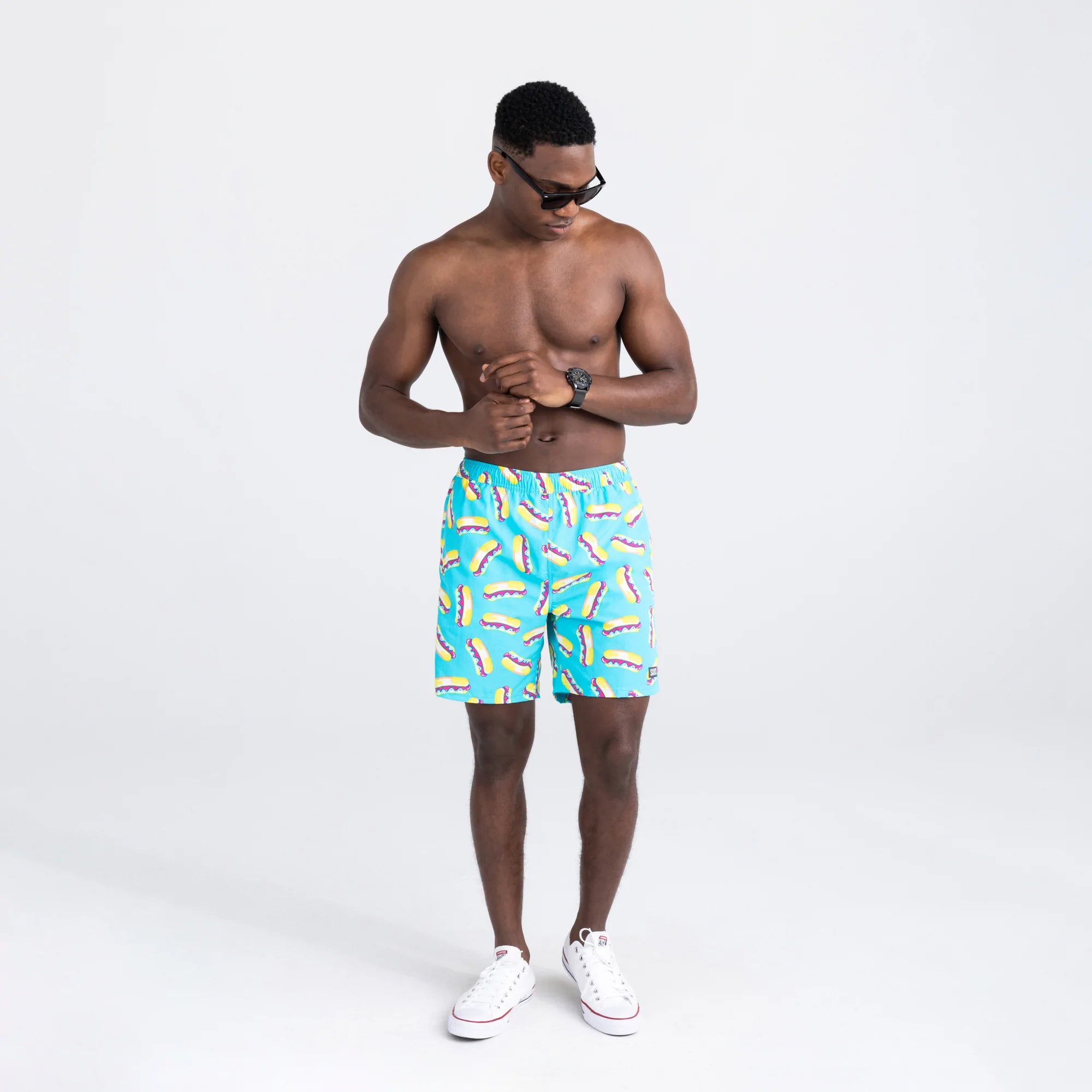 Front - Model wearing Go Coastal 2N1 Swim Volley Short 7" in Pop Dogs- Hyper Blue