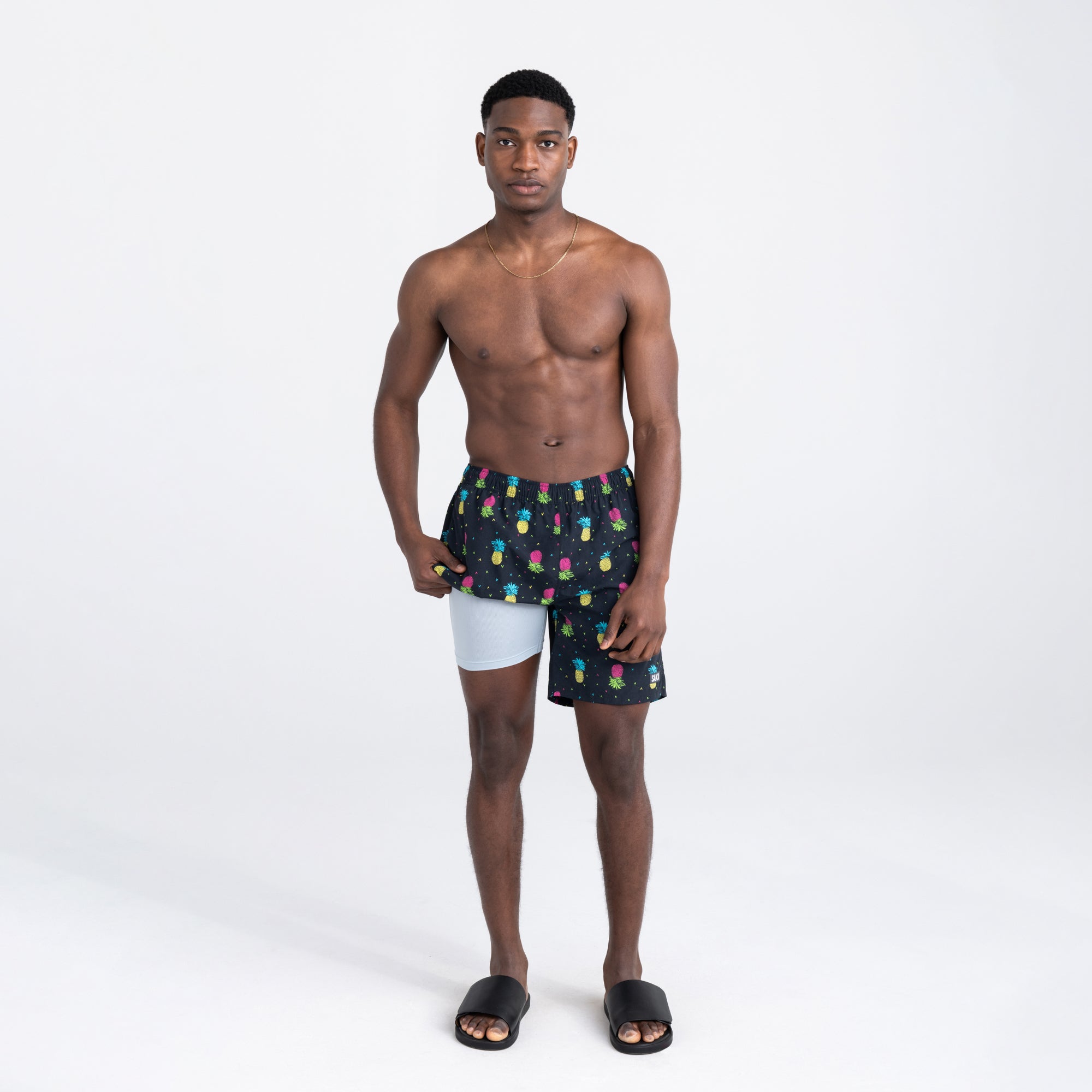 Front - Model wearing Go Coastal 2N1 Swim Volley Short 7" in Pineapple Flip- Black with liner
