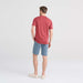 Back - Model wearing DropTemp Cooling Cotton Short Sleeve Crew in Red Clay