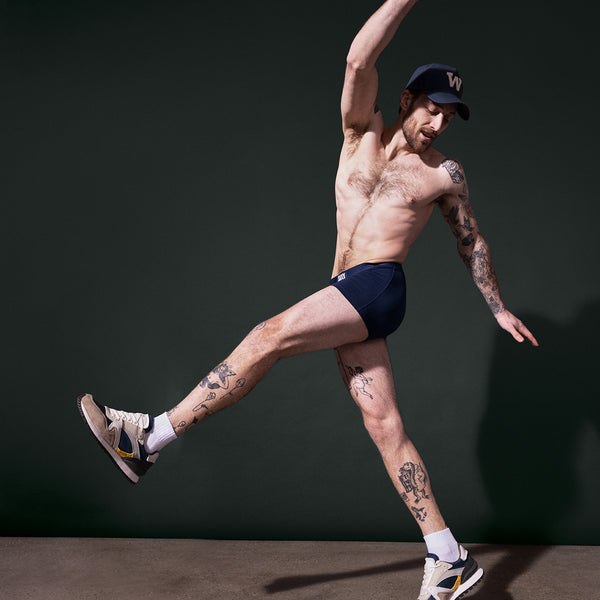 Model posing in Vibe Trunk in Navy Heather